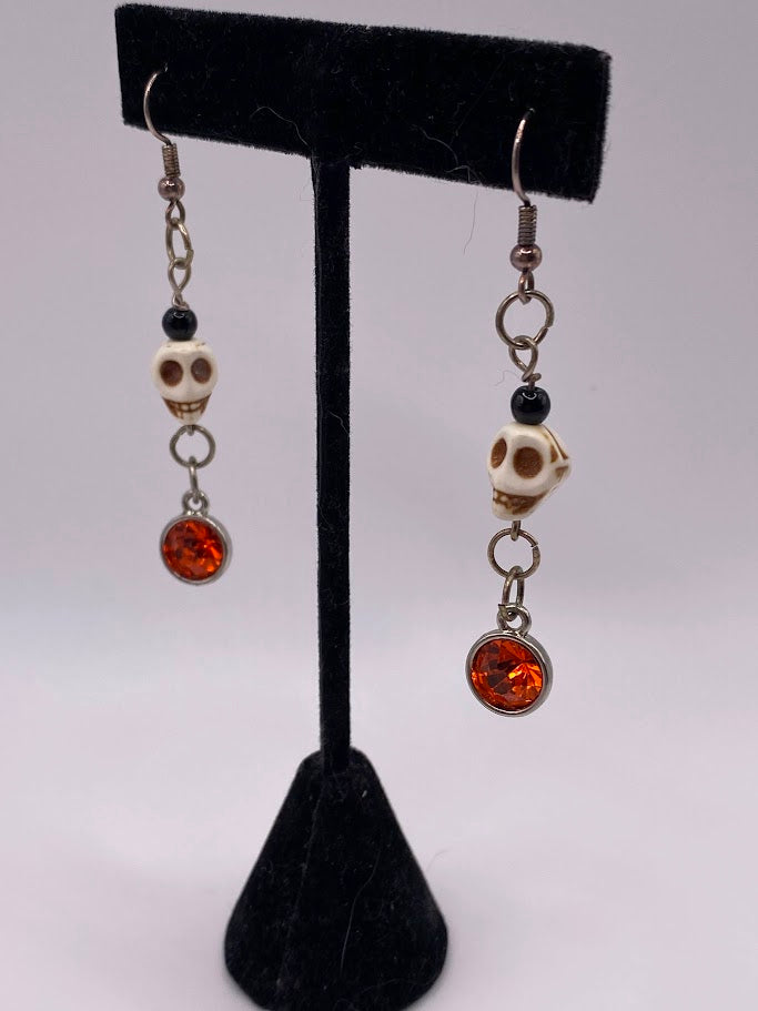 Skull Earrings with Orange Crystal