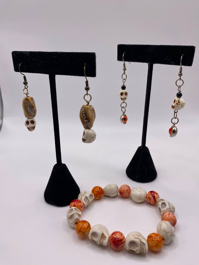 Skull Earrings with Orange Crystal