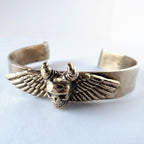 #210 Winged Skull Cuff by Emily Burton