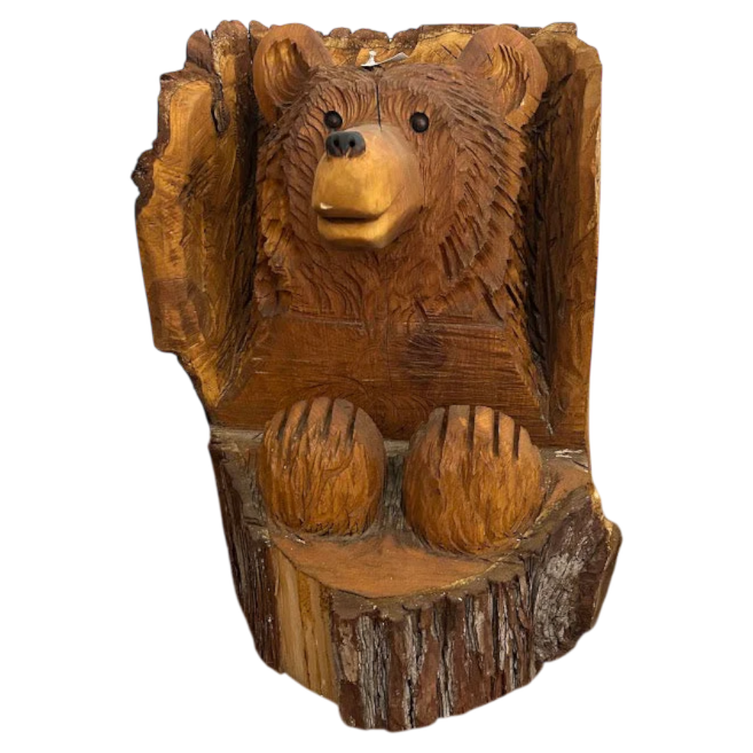 Chain Saw Bear in Tree Trunk