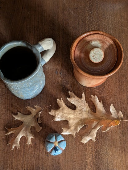 Burnt orange ceramic vessel & lid, hand built