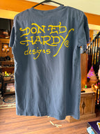 Shop our authentic vintage Y2K Ed Hardy Love Kills Slowly t-shirt in size Medium. Features the iconic skull & heart tattoo graphic on faded blue cotton.