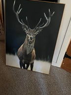Framed majestic stag deer painting by Linda Lauderbaugh featuring a large antlered buck against a moody dark background.