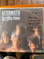 Vintage 1966 early stereo pressing vinyl record jacket for The Rolling Stones Aftermath on London Records, featuring moody band member portrait photography.