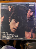 Vintage 1965 early stereo pressing vinyl record jacket for The Rolling Stones Out of Our Heads on London Records, featuring close-up portrait photography of the band members.