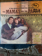 Vintage 1966 vinyl record cover for The Mamas and The Papas album If You Can Believe Your Eyes and Ears, showing the four band members sitting inside a tiled bathroom bathtub.