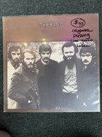 Vintage vinyl record sleeve for The Band self-titled 1969 album featuring a sepia-toned portrait photo of the five band members.